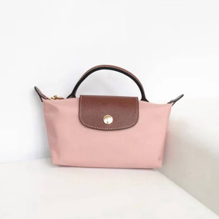 Zolvara - Skórzana Mini Torebka w Stylu Podpisu