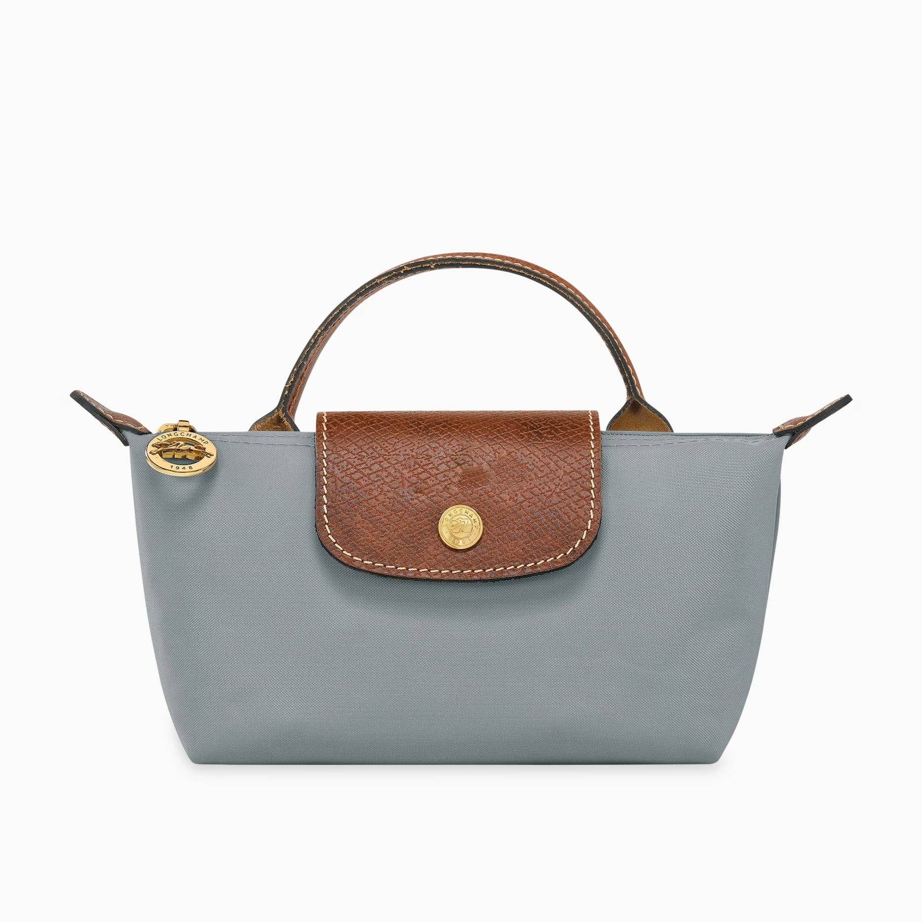 Zolvara - Skórzana Mini Torebka w Stylu Podpisu