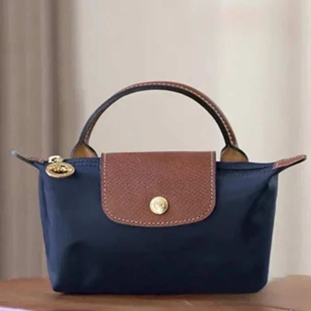 Zolvara - Skórzana Mini Torebka w Stylu Podpisu