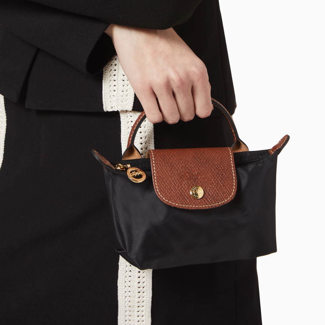 Zolvara - Skórzana Mini Torebka w Stylu Podpisu