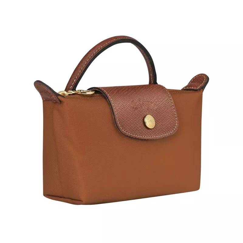 Zolvara - Skórzana Mini Torebka w Stylu Podpisu